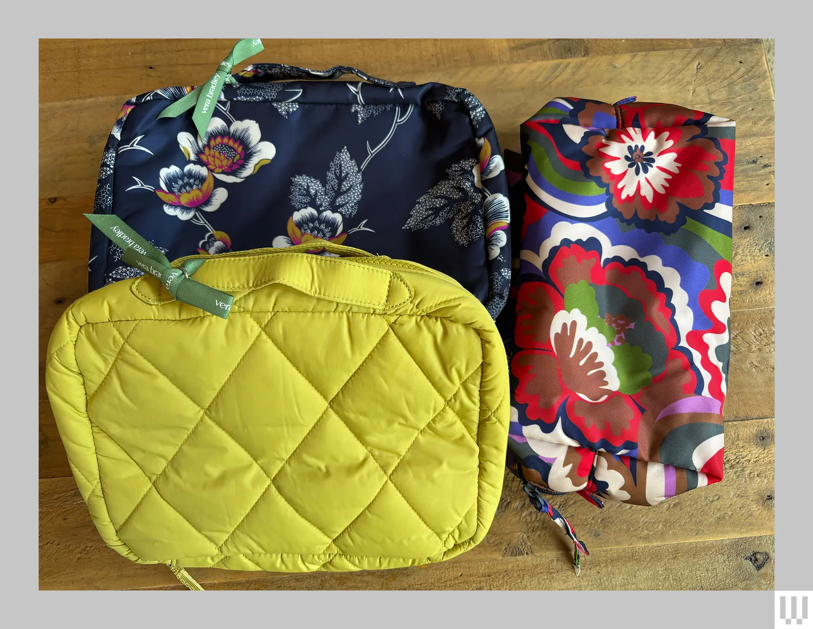 Vera Bradley toiletry bags in a variety of prints including yellow blue floral and red floral patterns