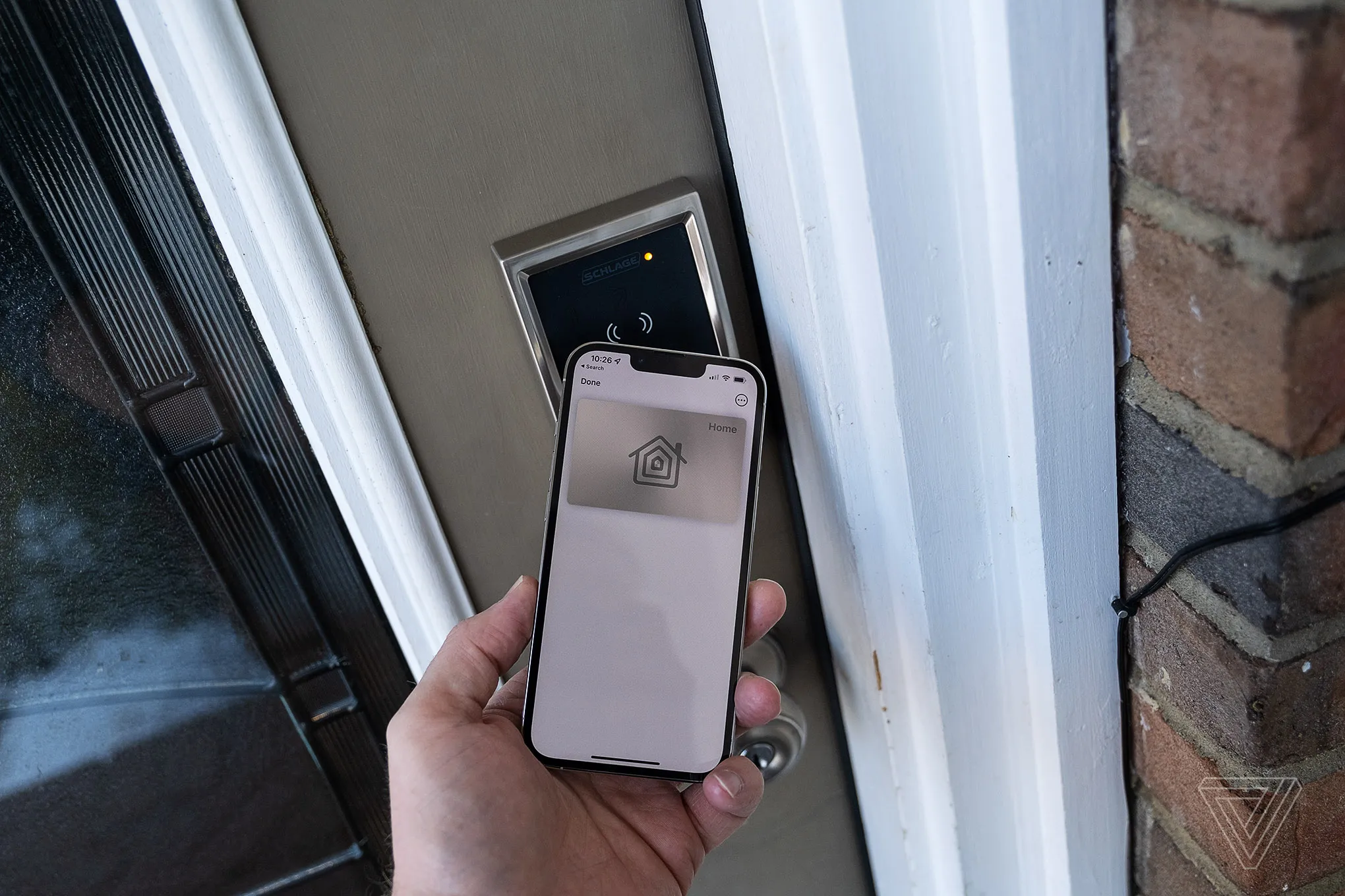 I tested 30 smart locks, and these are the best 16 An iPhone being used to unlock the Schlage Encode Plus smart lock.